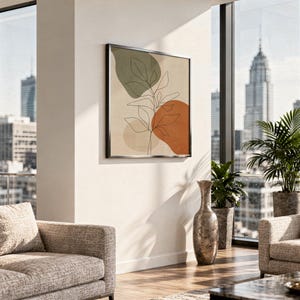 Framed botanical line drawing hanging next to a large window with a city skyline view.