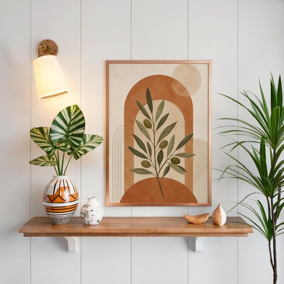 Boho terracotta poster on floating wooden shelf above green indoor plants