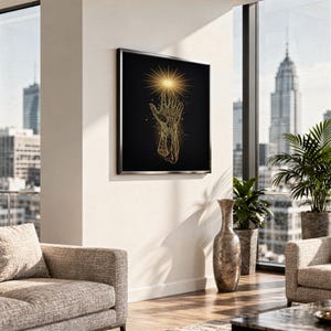 Celestial hand wall art print hanging above a stone countertop with a fruit bowl in a sunny kitchen.