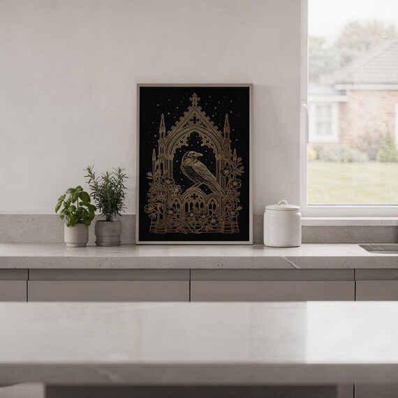Gothic raven wall art print hanging in a high-rise apartment living room with a city skyline view.