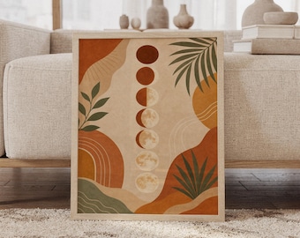 May include: A framed wall art print featuring a vertical sequence of moon phases in the center, surrounded by abstract shapes in terracotta, sage green, and cream. The design includes stylized palm leaves and arched line patterns.