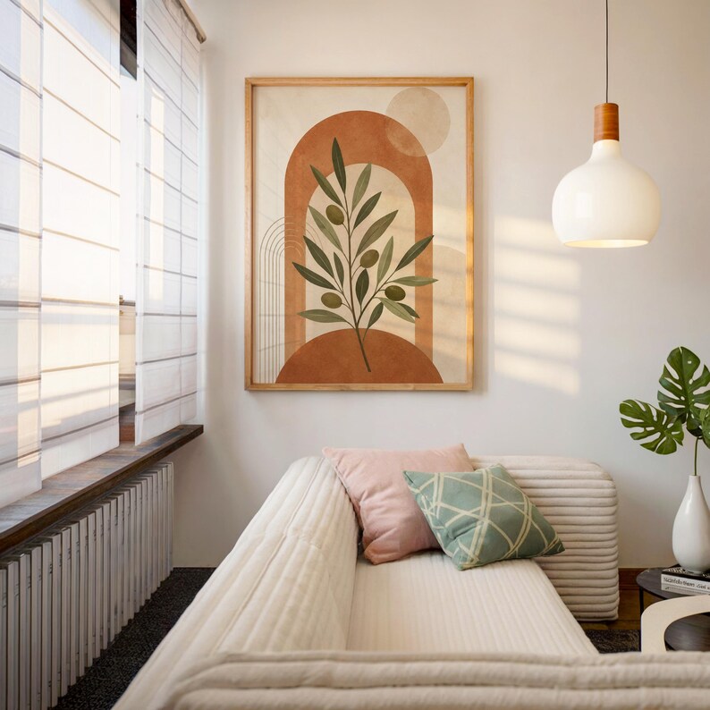 Mid century olive branch art displayed in bright sunlit cozy interior room