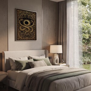 Occult snake wall art print hanging above a bed with sage green pillows in a calm neutral bedroom.