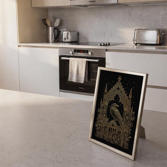 Gothic raven wall art print framed and displayed in a modern home interior.