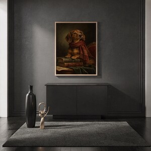Dachshund wall art print standing on a countertop in a modern white kitchen.