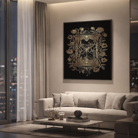 Gothic hourglass wall art print hanging above a light gray sofa in a modern living room with evening city views through tall windows.