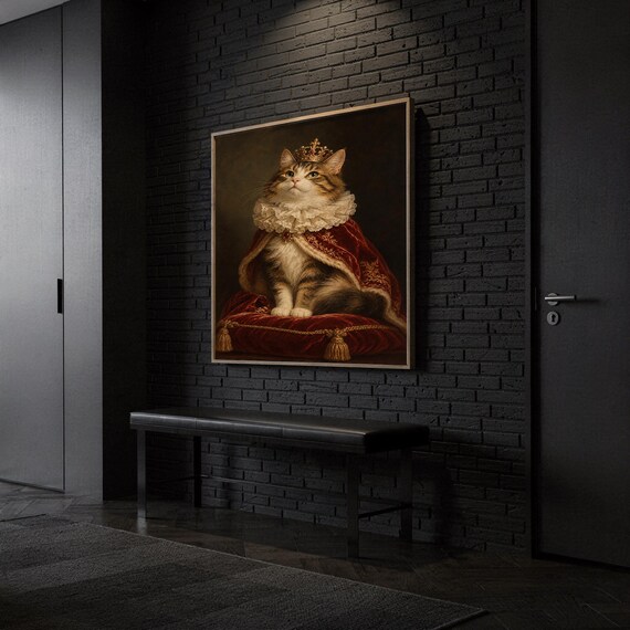 Royal cat portrait wall art print hanging above a dark wood console and jute rug in a warm neutral interior.
