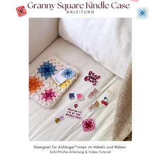 May include: A crocheted Kindle case in a granny square design, featuring squares of blue, orange, and pink. The case is on a white surface, surrounded by stickers with book and reading-related themes. Text on the image reads "Granny Square Kindle Case ANLEITUNG".