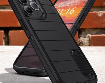 May include: Black phone case with a textured, horizontal-lined design. The case has a built-in kickstand and surrounds a phone displaying the date and time. The background is a brick wall.