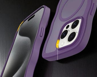 May include: Close-up of two purple phone cases. One case is angled, revealing the phone's screen, while the other displays the camera cutouts. The cases have a smooth, matte finish and a protective design.