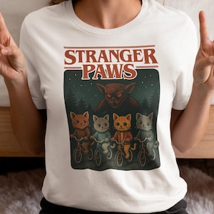 Stranger Paws | Unisex Tee, Funny Cat Shirt for Series Fans Retro Bike Cats Graphic Tee Cute Horror Things Parody Shirt Gift & Pop Culture