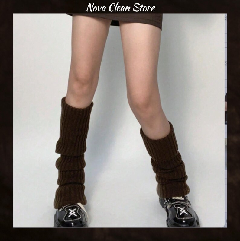 May include: Brown leg warmers with a ribbed design. The leg warmers are worn over black shoes. The image includes the text "Nova Clean Store" at the top.