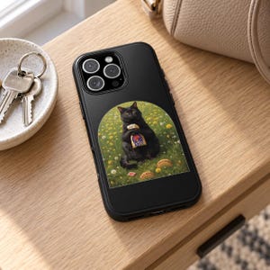 May include: A black smartphone case featuring a circular graphic of a black cat sitting in a field of yellow flowers and green grass, holding a Taco Bell bag. The cat is surrounded by scattered tacos on the ground, with a camera lens cutout at the top.