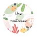 UneMaitresse store logo