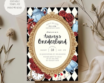 May include: An invitation with an Alice in Wonderland theme. The design features a gold oval frame with the text "Aurora's Onederland". The invitation includes illustrations of a teapot, roses, and playing cards. The background is black and white checkered.
