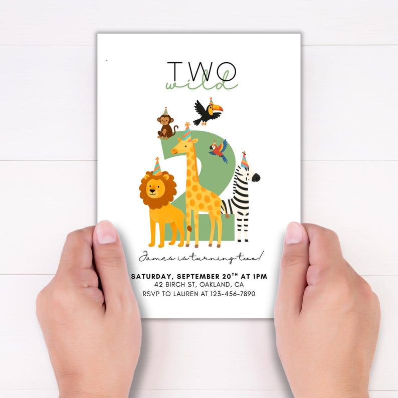 May include: A white invitation card with the text "TWO wild" and a large green number "2" featuring cartoon animals. The card includes event details: "James is turning two!" and RSVP information.