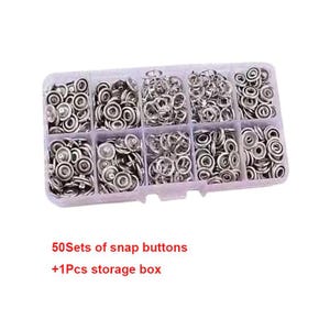 May include: A clear plastic storage box filled with silver snap buttons. The box is divided into ten compartments, each containing a different quantity of the snap buttons. The text "50 Sets of snap buttons +1Pcs storage box" is visible.