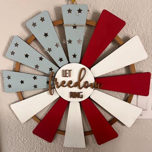 May include: A set of three ceramic mugs with a speckled, matte finish. The mugs are in shades of cream, light gray, and dark gray. Each mug has a simple, minimalist design and a rounded handle.