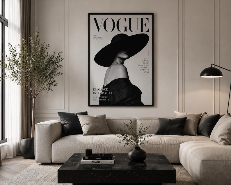 May include: A framed black and white wall art print featuring a Vogue magazine cover with a person wearing a wide-brimmed hat and an off-the-shoulder garment. The text includes the word VOGUE, PARIS, STYLE IS A WAY TO SAY WHO YOU ARE WITHOUT SPEAKING, and &Eacute;L&Eacute;GANCE INTEMPORELLE.