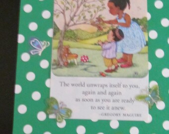 Upcycled Mary Englebreit post card "The world unwraps itself to you, again & again as soon as you are ready to see it anew." Gregory Maguire