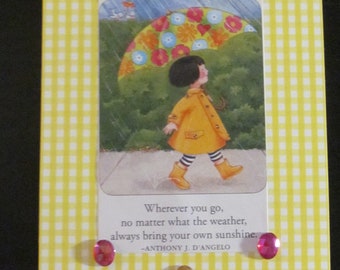 Upcycled Mary Englebreit post card, "Wherever you go, no matter the weather, always bring your own sunshine." Anthony J. D'Angelo