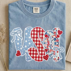 May include: A rustic wooden sign with the text "Welcome to our home" in white lettering. The sign features a distressed finish and a simple, inviting design, perfect for entryway decor.