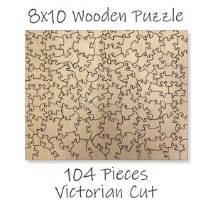 May include: A 104-piece wooden jigsaw puzzle with a Victorian cut. The puzzle is 8x10 inches and has a light brown wood finish.