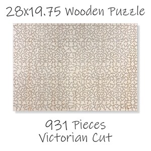 A wooden puzzle with a Victorian cut design, containing 931 pieces.