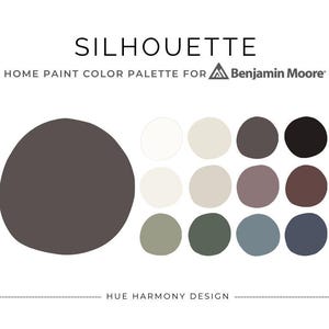 May include: A home paint color palette for Benjamin Moore, featuring the word "SILHOUETTE". The palette includes a large, dark gray shape and a series of smaller, round color swatches in various neutral tones, including white, beige, and gray.