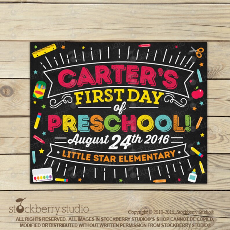 May include: A chalkboard-style sign with the text "CARTER'S FIRST DAY of PRESCHOOL! August 24th 2016 LITTLE STAR ELEMENTARY." The sign is decorated with colourful school supplies and stars, perfect for a child's first day of school.