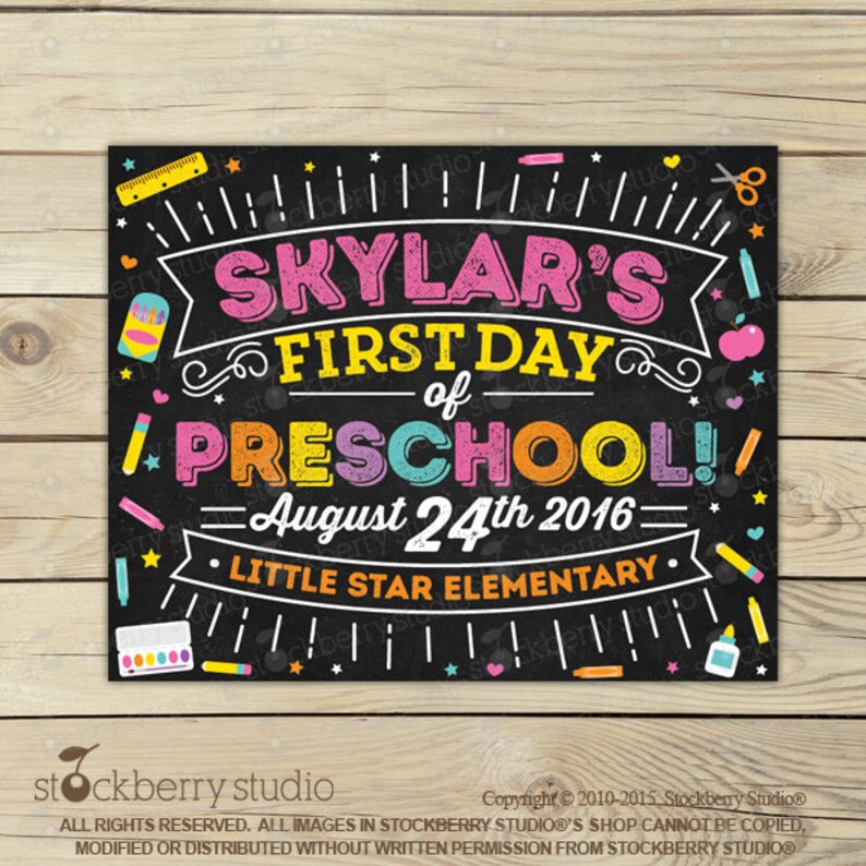 May include: A chalkboard sign announcing "Skylar's First Day of Preschool!" in bright colours. The sign includes the date "August 24th 2016" and "Little Star Elementary", with illustrations of school supplies.