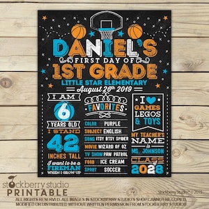 May include: A basketball-themed chalkboard sign for the first day of 1st grade. It features orange and blue text, including Daniel's name, school details, and personal favorites like age 6, 42 inches tall, and the goal to be a fireman.