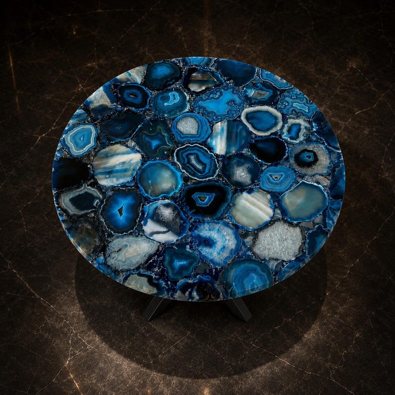 Luxury gemstone accent table crafted with polished blue agate slabs and a durable designer stand.
Statement living room furniture displaying rich blue agate patterns with sophisticated modern appeal.