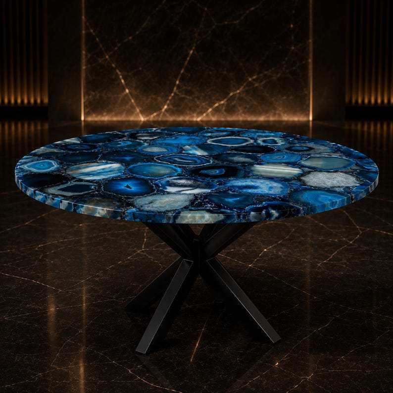 Designer lounge furnishing with polished gemstone mosaic surface and architectural metal support.
Exclusive handcrafted blue agate furniture piece created for contemporary and luxury interiors.