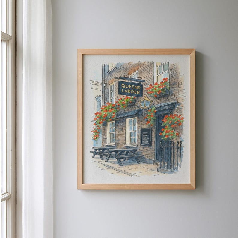 May include: Watercolor painting of a pub called "Queens Larder" in a wooden frame. The pub has a brick facade, with red flowers in window boxes and above the door. A black sign hangs above the door.