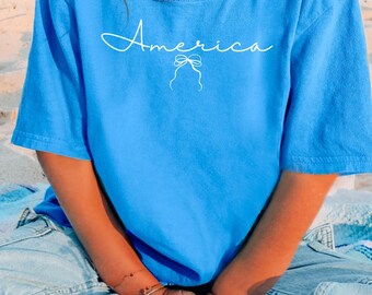 Camiseta juvenil para niñas con diseño de Estados Unidos y lazo, 4 de julio, colores cómodos.