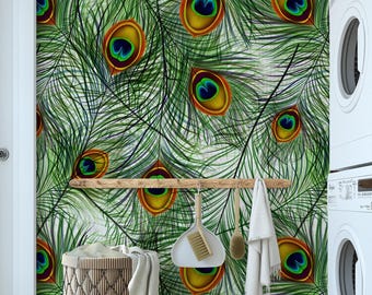 May include: Peacock feather wallpaper with a repeating pattern of green, yellow, and blue eye-like designs. A wooden rack holds a brush, a dustpan, and a white towel. A round basket with a white towel is in the foreground.