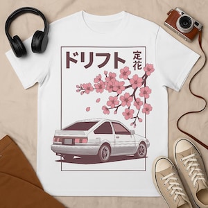 Cherry Blossom Drift Car T-Shirt – Japanese AE86 Retro Tee – Sakura Streetwear – JDM Aesthetic Shirt – Gift for Car Lovers