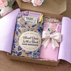 May include: A white ceramic mug with a black handle and the text "But First, Coffee" in a handwritten style. The mug is on a white surface. The mug is approximately 4 inches tall.