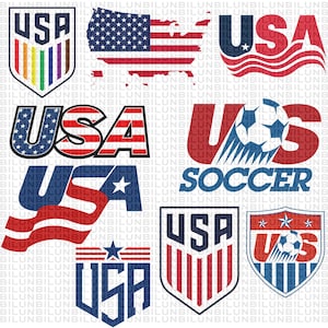 May include: A collection of USA soccer-themed graphic designs featuring the text USA, national flag patterns, shield emblems, and soccer ball illustrations in red, white, and blue, with one shield emblem incorporating a rainbow-colored stripe design.