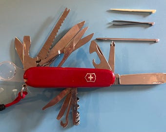 Victorinox Champion ,Plus model, Messerspezi accessories, 91mm,loaded with tools.