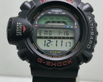 Reloj de pulsera Casio G-Shock 1161 DW-6500 Alti-Baro con alarma y cronógrafo digital de cuarzo japonés para hombre.
