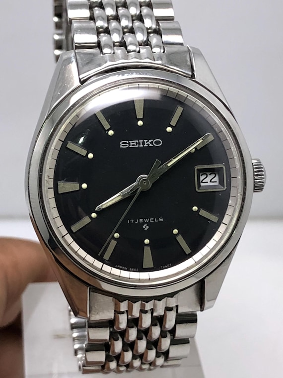 Vintage Seiko 6602-7040 Manual Winding 17 Jewels Black Dial Japan