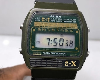 Reloj de pulsera vintage Seiko Alba Y446-4030 con alarma, cronógrafo, color militar, digital, de cuarzo, japonés, para hombre