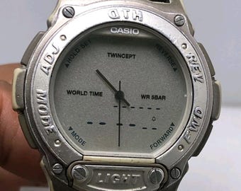 Vintage Casio Data Bank 1790 ABX-60 Twincept World Time Ana-digi