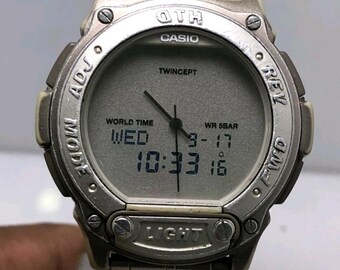 Vintage Casio Data Bank 1790 ABX-60 Twincept World Time Ana-digi