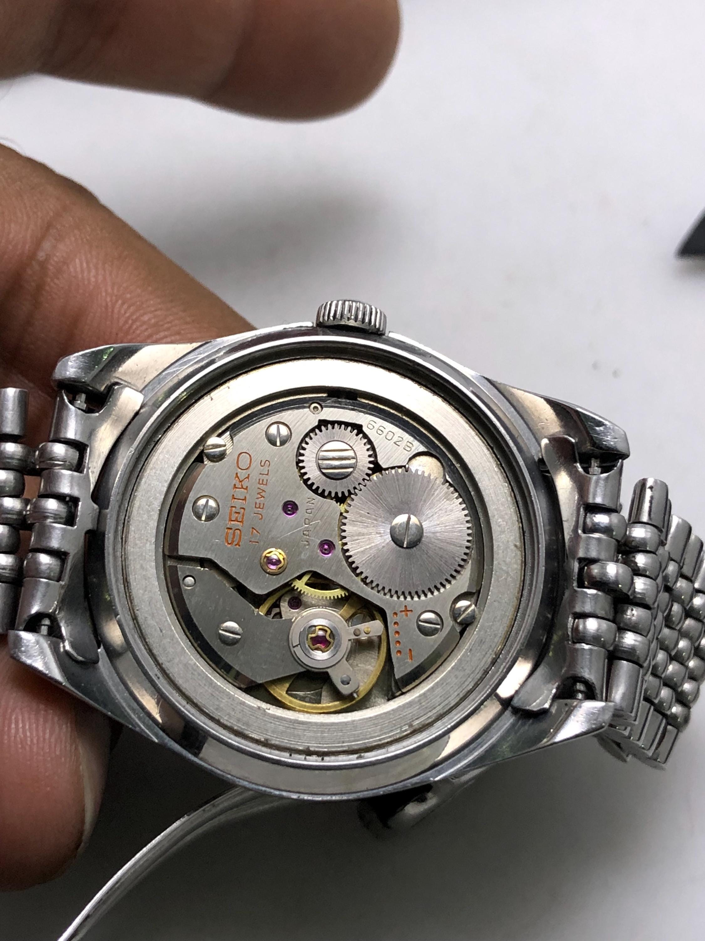 Vintage Seiko 6602-7040 Manual Winding 17 Jewels Black Dial Japan