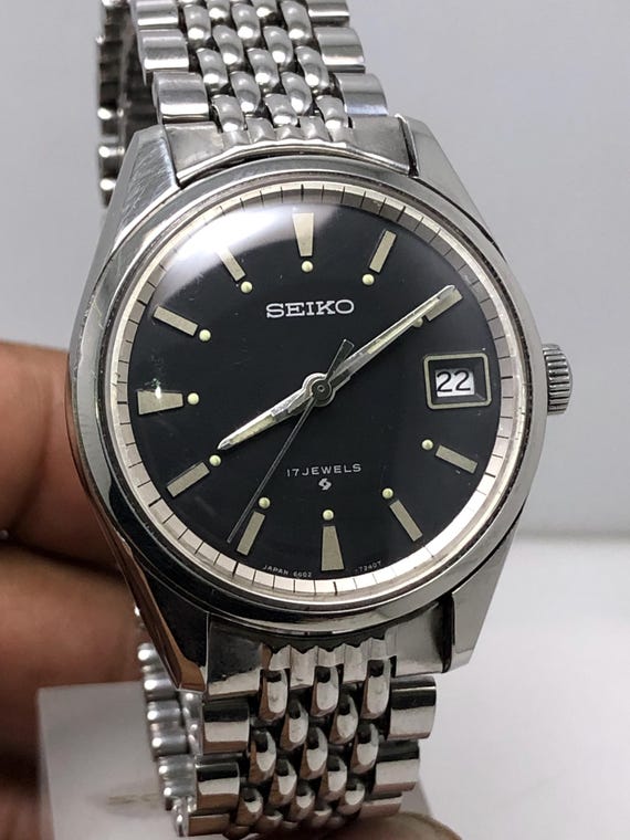 Vintage Seiko 6602-7040 Manual Winding 17 Jewels Black Dial Japan