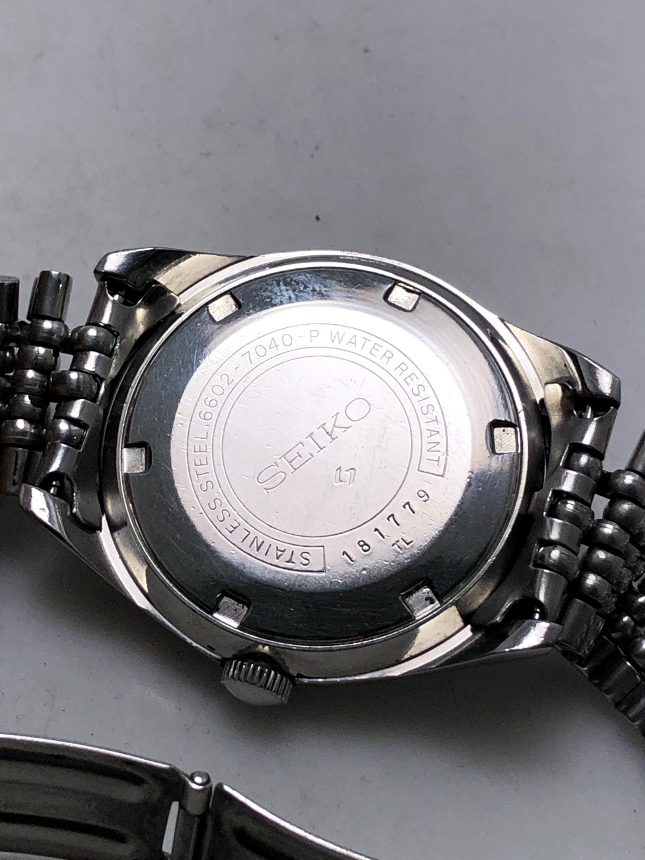 Vintage Seiko 6602-7040 Manual Winding 17 Jewels Black Dial Japan