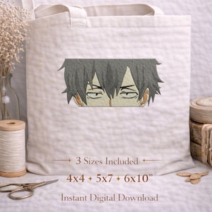 May include: A beige tote bag featuring an embroidered anime boy design. The design includes the boy's eyes and hair. Text on the bag reads "Anime Boy Embroidery Design" and "3 Sizes Included 4x4 + 5x7 + 6x10".